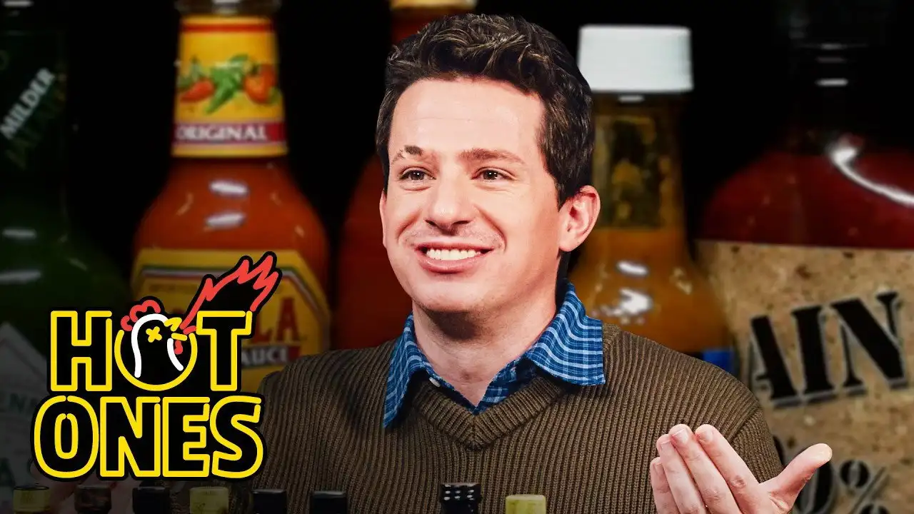 Charlie Puth Beats Himself Up While Eating Spicy Wings