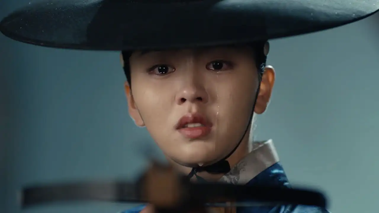 Dong-Ju Stands Before the King