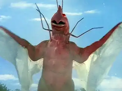 The Insect Humanoid Masquerades as a Woman